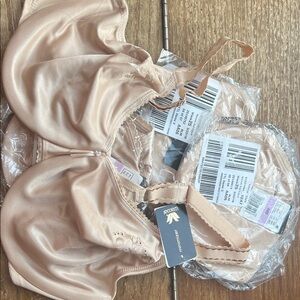 4 Wacoal Satin Bras in Light Tan size 38D. Minimizer